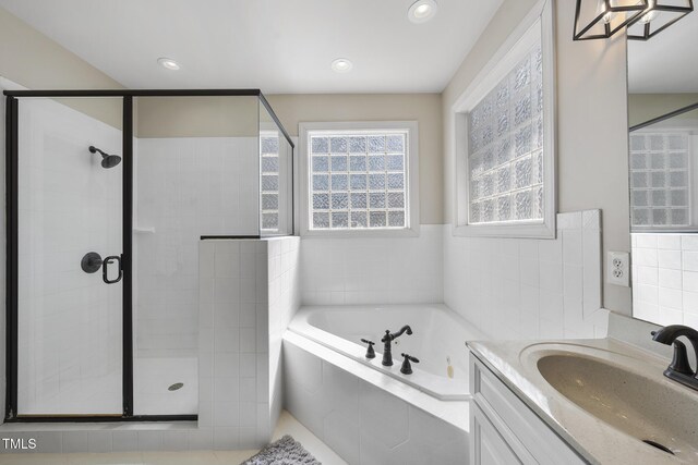 1006 Henny Pl, Raleigh, NC 27614 - bathroom featuring a bath, a shower stall, vanity, and recessed lighting