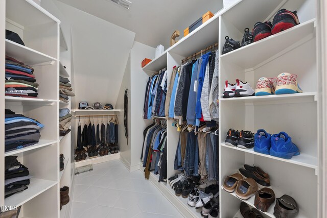 1006 Henny Pl, Raleigh, NC 27614 - walk in closet with tile patterned flooring