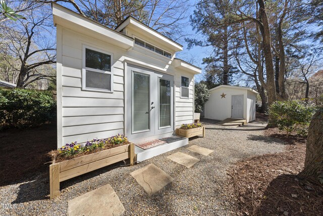 1006 Henny Pl, Raleigh, NC 27614 - back of house with french doors