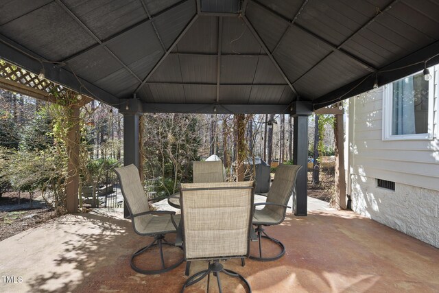 1006 Henny Pl, Raleigh, NC 27614 - view of patio with a gazebo and outdoor dining space