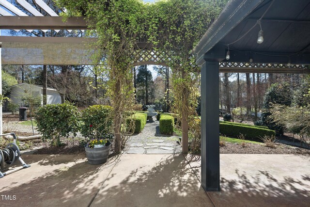 1006 Henny Pl, Raleigh, NC 27614 - view of patio with a pergola
