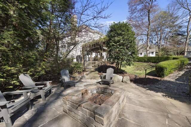 1006 Henny Pl, Raleigh, NC 27614 - view of patio with an outdoor fire pit