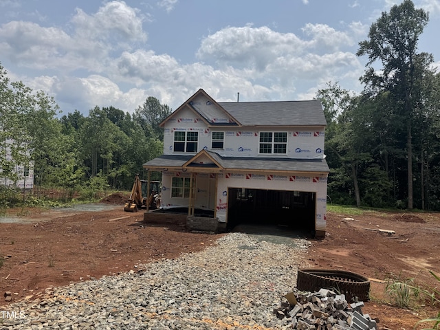 5504 Jaeger Dr Lot # 76, Graham, NC 27253 - property in mid-construction featuring an attached garage and driveway