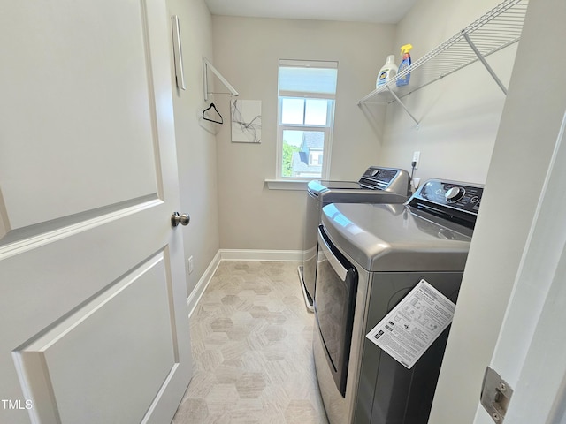 1412 Queen Trigger Dr, Fuquay Varina, NC 27526 - washroom featuring washing machine and dryer and baseboards