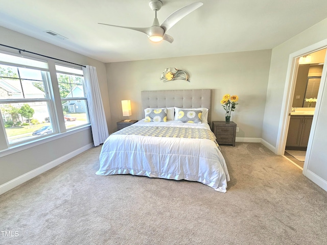 1412 Queen Trigger Dr, Fuquay Varina, NC 27526 - bedroom with carpet flooring, baseboards, ceiling fan, and ensuite bathroom