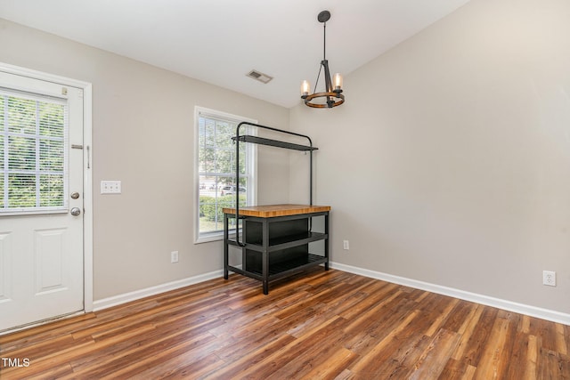 5437 Advantis Dr, Raleigh, NC 27610 - entryway featuring a chandelier, wood finished floors, and baseboards
