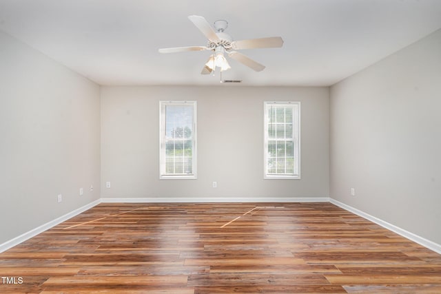 5437 Advantis Dr, Raleigh, NC 27610 - unfurnished room with wood finished floors, baseboards, and ceiling fan