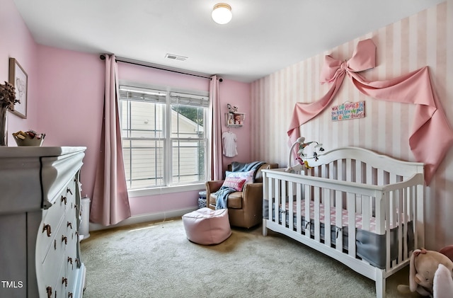 908 Town Side Dr, Apex, NC 27502 - carpeted bedroom with wallpapered walls, baseboards, and a crib