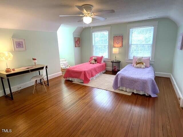 11609 US-401, Fuquay Varina, NC 27526 - bedroom featuring wood finished floors, baseboards, and ceiling fan