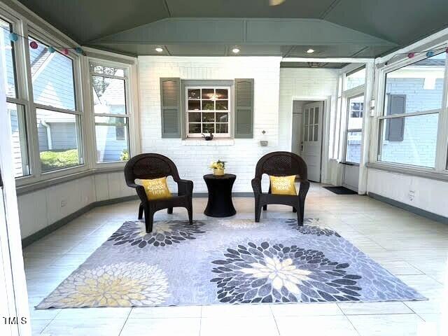 11609 US-401, Fuquay Varina, NC 27526 - sunroom / solarium with healthy amount of natural light, lofted ceiling, and tile patterned floors