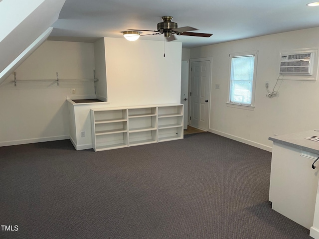 11609 US-401, Fuquay Varina, NC 27526 - interior space featuring a ceiling fan, dark carpet, an AC wall unit, and baseboards