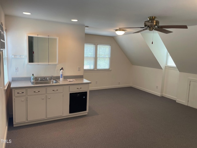 11609 US-401, Fuquay Varina, NC 27526 - kitchen with a sink, a ceiling fan, dark carpet, vaulted ceiling, and light countertops