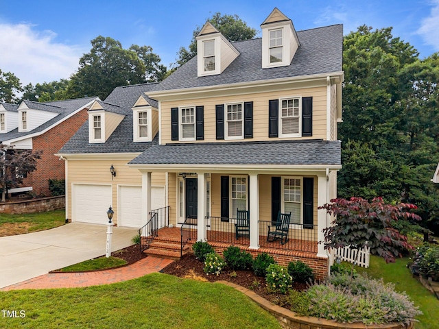 1412 Kings Lassiter Way, Raleigh, NC 27614 - view of front of home with covered porch, a shingled roof, concrete driveway, a garage, and a front lawn