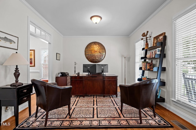 1412 Kings Lassiter Way, Raleigh, NC 27614 - office space featuring wood finished floors, crown molding, plenty of natural light, and baseboards