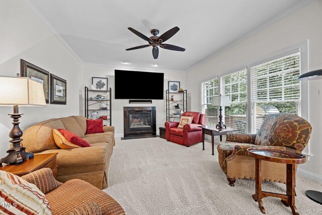 1412 Kings Lassiter Way, Raleigh, NC 27614 - living room with carpet flooring, ornamental molding, ceiling fan, a fireplace with flush hearth, and baseboards