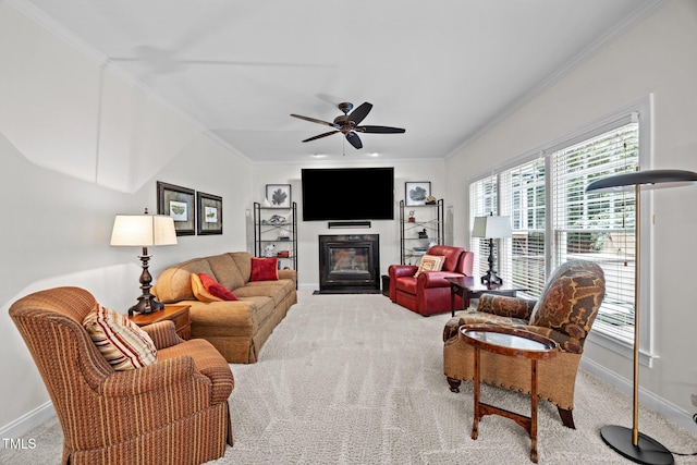 1412 Kings Lassiter Way, Raleigh, NC 27614 - carpeted living area featuring baseboards, ornamental molding, a glass covered fireplace, and healthy amount of natural light