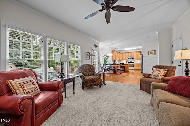 1412 Kings Lassiter Way, Raleigh, NC 27614 - living room featuring crown molding, ceiling fan, and light wood-style floors