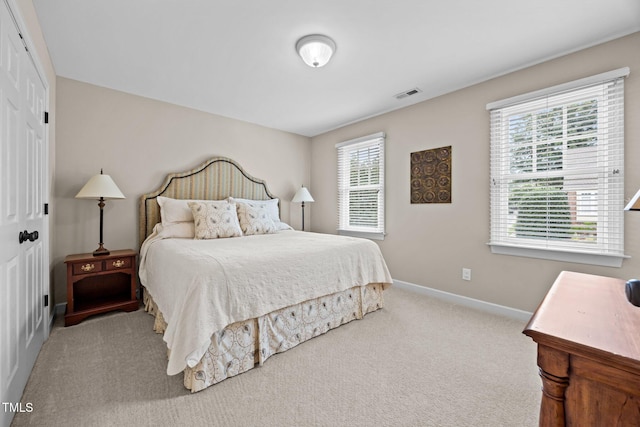 1412 Kings Lassiter Way, Raleigh, NC 27614 - bedroom with carpet floors, baseboards, and a closet