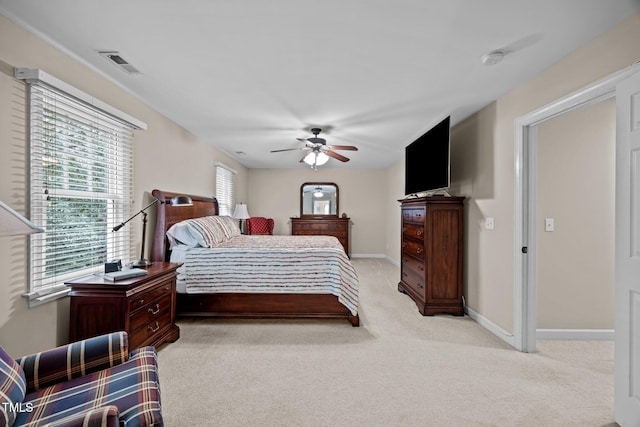 1412 Kings Lassiter Way, Raleigh, NC 27614 - bedroom featuring light colored carpet, a ceiling fan, and baseboards
