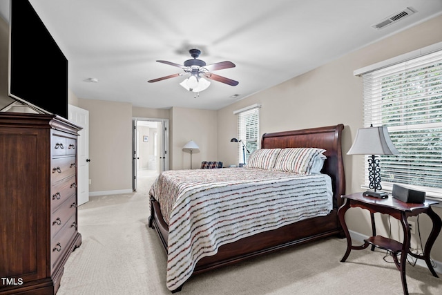 1412 Kings Lassiter Way, Raleigh, NC 27614 - bedroom featuring light carpet, baseboards, and ceiling fan