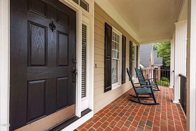 1412 Kings Lassiter Way, Raleigh, NC 27614 - view of exterior entry with a porch