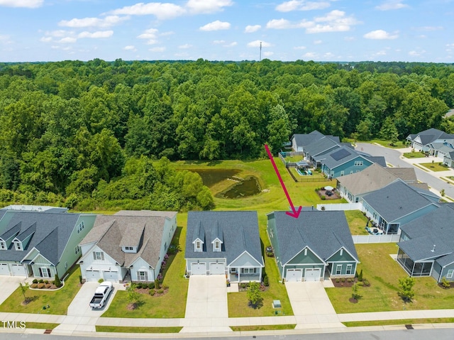 797 S Wilma St, Angier, NC 27501 - aerial perspective of suburban area with a heavily wooded area