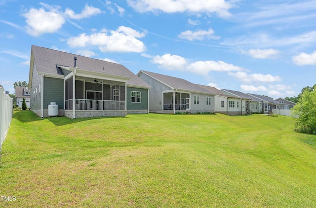 797 S Wilma St, Angier, NC 27501 - back of property featuring a sunroom and ceiling fan