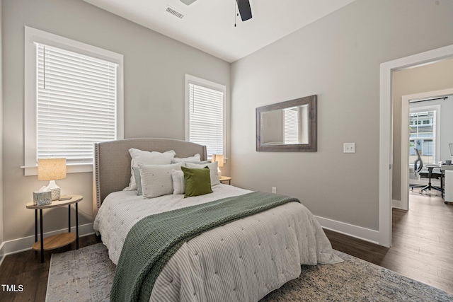 797 S Wilma St, Angier, NC 27501 - bedroom with baseboards, wood finished floors, and ceiling fan