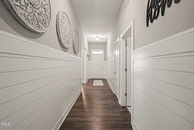 797 S Wilma St, Angier, NC 27501 - corridor with a wainscoted wall and dark wood-style flooring
