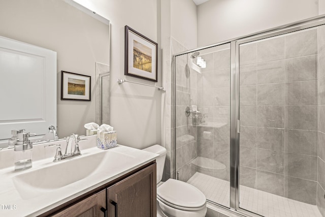 797 S Wilma St, Angier, NC 27501 - bathroom featuring toilet, vanity, and a shower stall