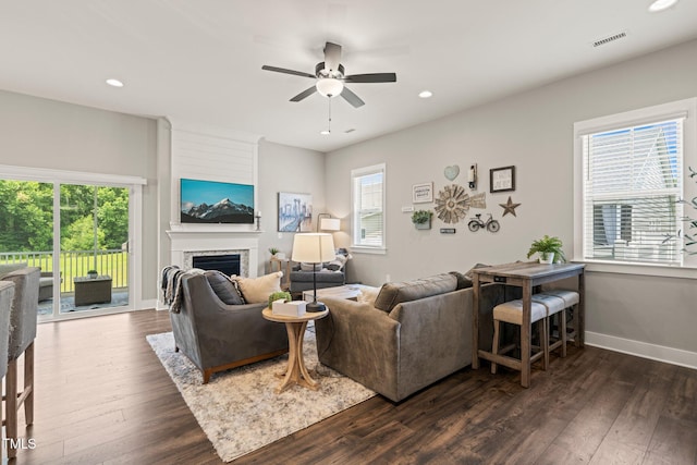 797 S Wilma St, Angier, NC 27501 - living room with plenty of natural light, ceiling fan, dark wood-style flooring, a fireplace, and recessed lighting