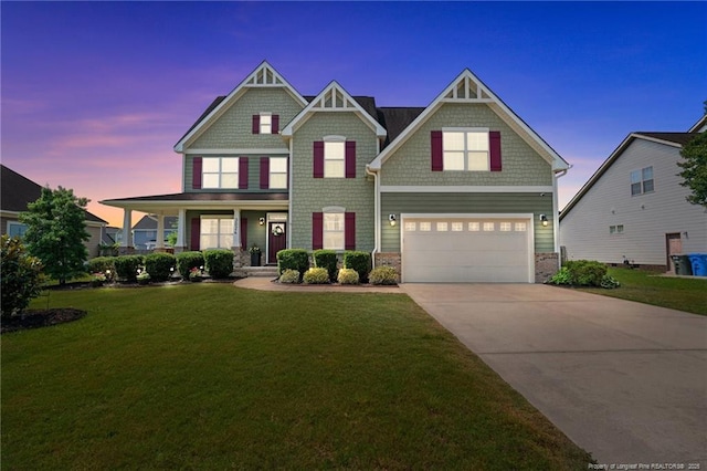 3024 Eagle Crest Ln, Fayetteville, NC 28306 - craftsman-style home with a garage, a lawn, concrete driveway, covered porch, and stone siding