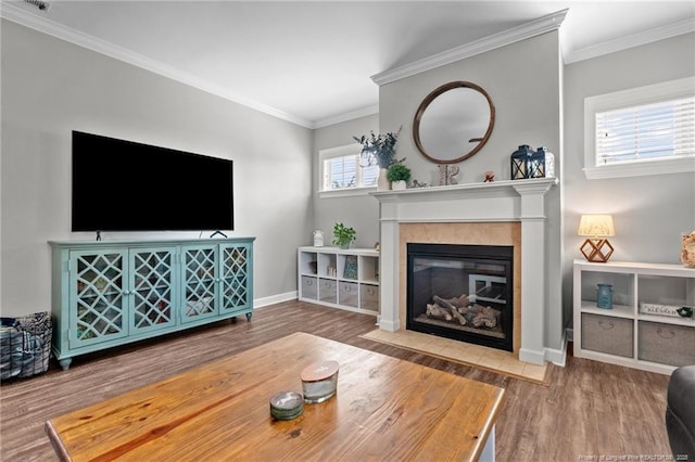 3024 Eagle Crest Ln, Fayetteville, NC 28306 - living area with a fireplace with flush hearth, wood finished floors, crown molding, and baseboards