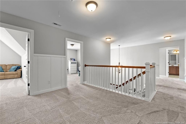 3024 Eagle Crest Ln, Fayetteville, NC 28306 - hall with carpet floors and an upstairs landing