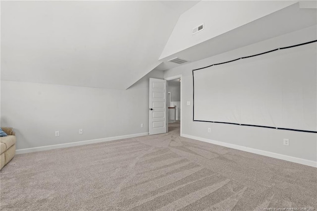 3024 Eagle Crest Ln, Fayetteville, NC 28306 - carpeted cinema with vaulted ceiling and baseboards