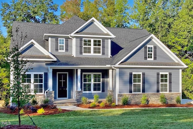 0-1 Rowe Ests, Macon, NC 27551 - craftsman-style house with stone siding, a front yard, and a shingled roof
