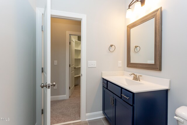 0-1 Rowe Ests, Macon, NC 27551 - bathroom featuring vanity, baseboards, and toilet