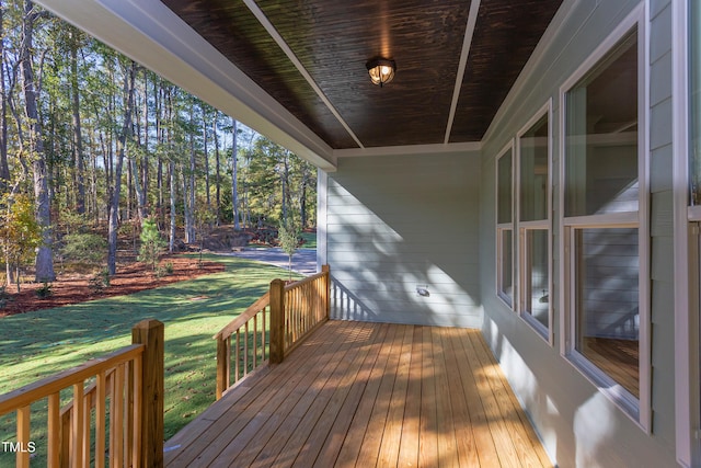 0-1 Rowe Ests, Macon, NC 27551 - wooden porch featuring a lawn