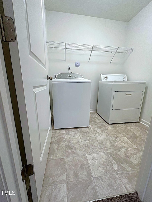 391 Curling Crk Dr, Clayton, NC 27527 - washroom featuring washer and dryer and baseboards