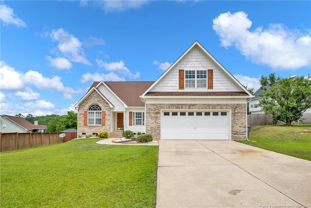 5533 Shady Pine Ct, Hope Mills, NC 28348 - view of front of home with driveway, brick siding, and a garage