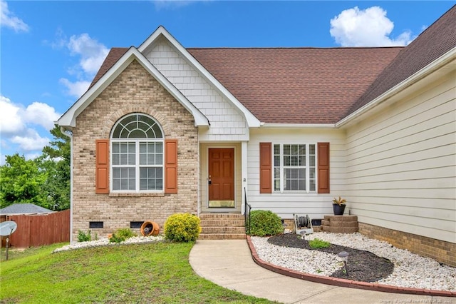 5533 Shady Pine Ct, Hope Mills, NC 28348 - view of front of home with crawl space, brick siding, and roof with shingles