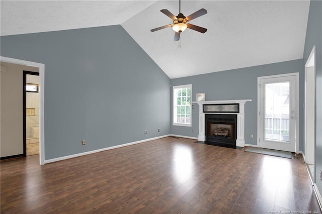 5533 Shady Pine Ct, Hope Mills, NC 28348 - unfurnished living room with a ceiling fan, high vaulted ceiling, wood finished floors, a fireplace with flush hearth, and baseboards