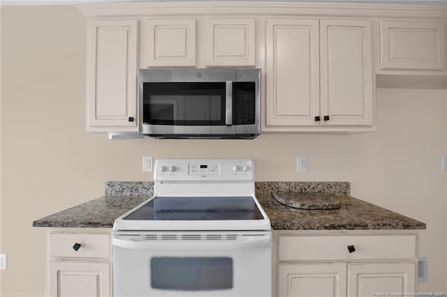 5533 Shady Pine Ct, Hope Mills, NC 28348 - kitchen featuring stainless steel microwave, white electric range oven, and dark stone counters
