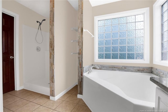 5533 Shady Pine Ct, Hope Mills, NC 28348 - full bath with a garden tub, a stall shower, tile patterned floors, and baseboards