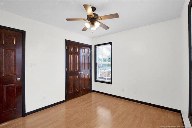 5533 Shady Pine Ct, Hope Mills, NC 28348 - unfurnished room featuring light wood-style floors, baseboards, and ceiling fan