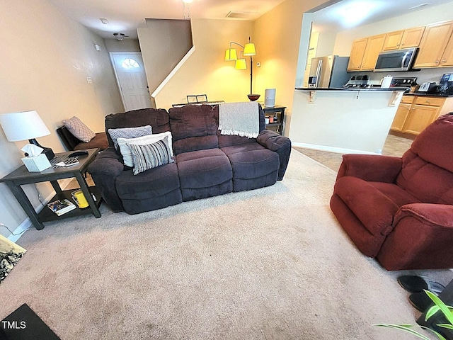 5126 Thornton Knoll Way, Raleigh, NC 27616 - living area with light carpet and baseboards
