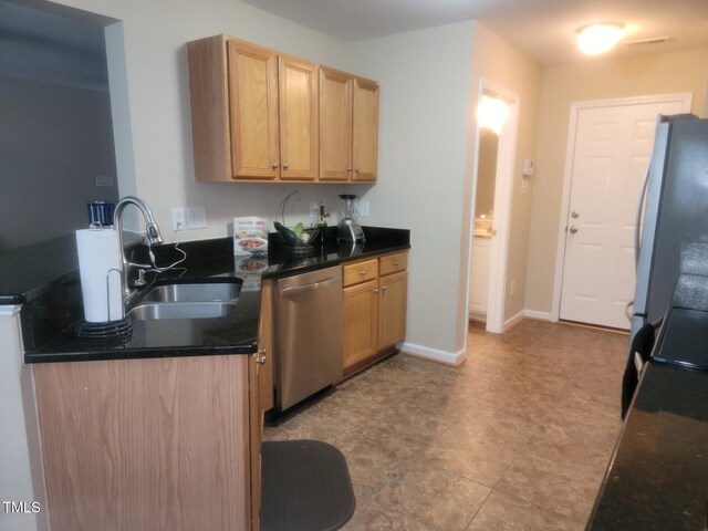5126 Thornton Knoll Way, Raleigh, NC 27616 - kitchen featuring appliances with stainless steel finishes, a peninsula, and light brown cabinets