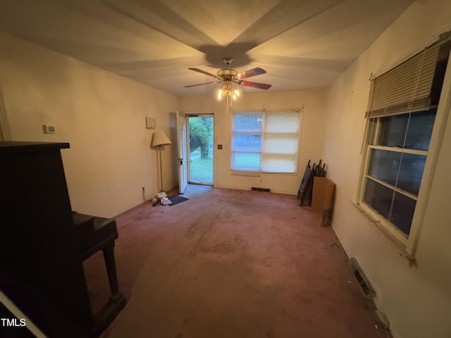 603 Pineland St, Sanford, NC 27330 - unfurnished living room featuring a ceiling fan