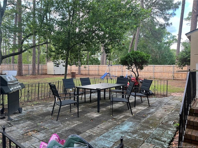 3914 Coventry Rd, Fayetteville, NC 28304 - fenced backyard with outdoor dining area, grilling area, and a patio area