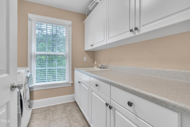3004 Krogen Ct, Creedmoor, NC 27522 - laundry room with cabinet space, baseboards, plenty of natural light, and washer and dryer